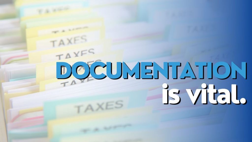 Rows of color-coded file folders labeled "TAXES" are partially visible on the left. The text "DOCUMENTATION is vital." is prominently displayed on the right side, with the word "DOCUMENTATION" in bold blue and "is vital." in white, highlighting the importance of vehicle-related record-keeping.